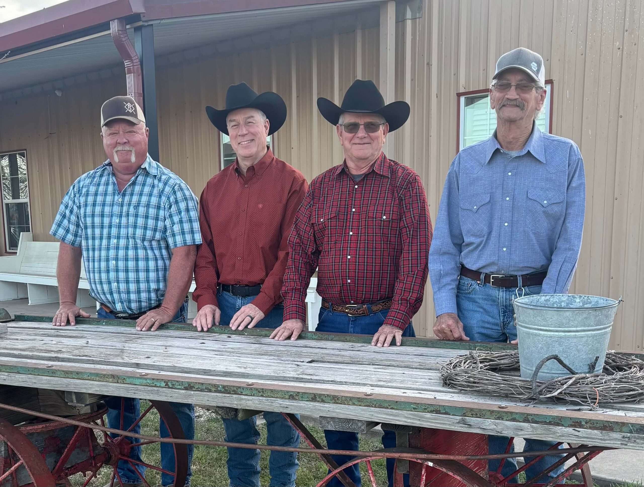 A person raising their hand in a group setting